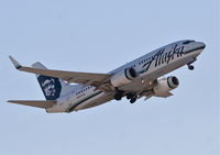 N617AS @ KPSP - Alaska Airlines Boeing 737-790, ASA591 to KPDX, 31L departure KPSP-note the fuel leaking from the right wing. - by Mark Kalfas