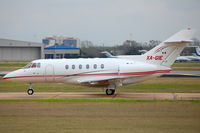 XA-GIE @ HOU - Taxiing to park (Customs) - by AJ Heiser