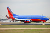 N645SW @ HOU - Landing roll rwy 12R - by AJ Heiser