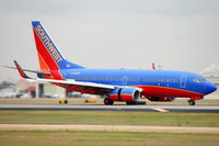 N705SW @ HOU - Landing roll rwy 12R - by AJ Heiser