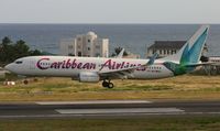 9Y-BGI @ TNCM - Caribbean airlines landing at TNCM runway 10 - by Sheep Gang