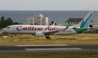 9Y-BGI @ TNCM - Caribbean airlines landing at TNCM runway 10