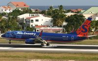 N801SY @ TNCM - Sun country N801SY landing at TNCM