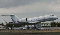 N811DF @ TNCM - N811DF departing TNCM. so sorry the sun was not shinning for this one. next time bro. safe flight!!!!!