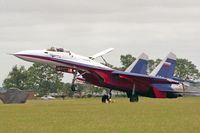 27598 @ EGXW - Sukhoi Su-27P. At RAF Waddington's Air Show in 1995. - by Malcolm Clarke