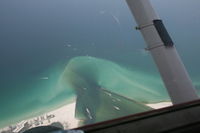 N18735 - Cessna N18735 Over Harbor Inlet - by Public Domain