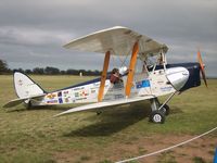 VH-GVA @ YMEL - Heavily sponsored Tiger Moth. Taken at Melton, Victoria, airfield, at the airshow commemorating the 100th anniversary of the first controlled powered flight in Australia on 18 March 1910 by Harry Houdini - by red750