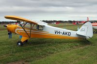 VH-AKD @ YMEL - Piper Cub Special. Taken at Melton, Victoria, airfield, at the airshow commemorating the 100th anniversary of the first controlled powered flight in Australia on 18 March 1910 by Harry Houdini - by red750