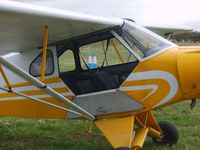 VH-AKD @ YMEL - Piper Cub Special. Entry door. - by red750