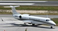 N809TD @ TNCM - N809TD taxing to parking at the cargo ramp - by Daniel Jef