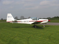 G-SKYC @ EGBR - Slingsby T-67M Firefly Mk2. At the British Aerobatic Association John McLean Trophy competition Breighton Airfield in 2004. - by Malcolm Clarke