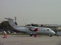 N328GT @ ONT - Parked on the southside of Ontario - by Helicopterfriend
