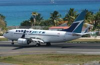 C-GUWJ @ TNCM - WestJet C-GUWJ landing at TNCM