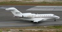 N900QS @ TNCM - N900QS taxing to take off runway 10 TNCM - by Daniel Jef