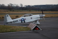 G-BXPI @ EGFH - Start up for dusk flight around the Gower - by Roger Winser