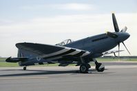 PS853 @ EGXW - Supermarine 389 Spitfire PR19 from RAF BBMF, Coningsby at RAF Waddington Photocall 1990. - by Malcolm Clarke