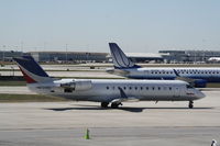 N709BR @ KORD - CL-600-2B19 - by Mark Pasqualino