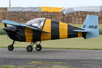 G-AWJE @ EGBR - Taxiing for departure at Breighton. - by MikeP