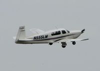 N555LM @ DTN - Off of runway 14 at Downtown Shreveport on a overcast day. - by paulp