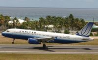 N408UA @ TNCM - United landing at TNCM