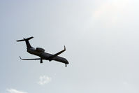 N17146 @ KIAH - ERJ on short final for 27. - by Darryl Roach