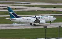 C-GVWJ @ TPA - West Jet 737-700 - by Florida Metal