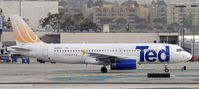 N495UA @ KLAX - Taxi at LAX - by Todd Royer