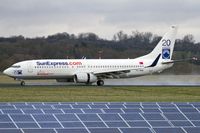TC-SNG @ EDDR - descelerating after touchdown on a wet runway - by Friedrich Becker