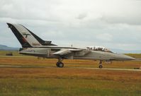 ZE339 @ EGQS - Tornado F.3, callsign Romeo 31, of 25 Squadron in the 1992 display season's markings awaiting clearance to join the active runway at RAF Lossiemouth in the Summer of 1992. - by Peter Nicholson