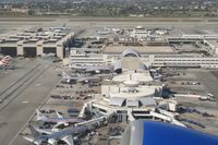 N559UA @ KLAX - United Airlines Boeing 757-222 N559UA, American Airlines Terminal 4 as seen on the climb out from 25R KLAX. - by Mark Kalfas