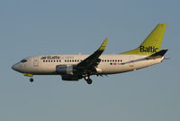 YL-BBH @ EBBR - Early arrival of flight BT601 to RWY 25L - by Daniel Vanderauwera