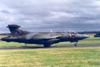 XX899 @ EGQS - Now preserved, this Buccaneer S.2B of 12 Squadron was preparing to join the active runway at RAF Lossiemouth in September 1991. - by Peter Nicholson