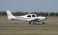 N690CD @ KAXN - Cirrus SR22 taxiing to runway 22 for take-off. - by Kreg Anderson