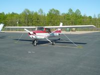 N704PW @ RUQ - At rest - by John W. Thomas