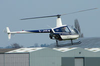 G-JHEW @ EGBW - Robinson R 22 at Wellesbourne - by Terry Fletcher