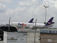 N602FE @ ONT - Parked and being loaded behind Fed Ex Bldg at Ontario - by Helicopterfriend