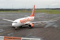 G-EZJS @ EGNT - Boeing 737-73V at Newcastle Airport in 2004. - by Malcolm Clarke