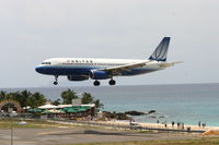 N472UA @ TNCM - United airlines over the tresh hold at runway 10 TNCM