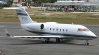 N722DJ @ TNCM - N722DJ back tracking the active for take off TNCM runway 10 - by Daniel Jef
