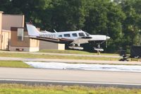 N33307 @ LAL - Arriving at Lakeland, FL during Sun N Fun 2010.