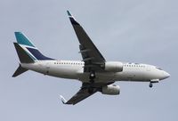 C-GWSN @ MCO - West Jet 737-700 - by Florida Metal