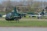 G-WRWR @ EGSF - Robinson R22 at Peterborough Conington - by Terry Fletcher