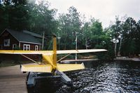 C-GTGN @ LK. BAPTIS - C-GTGN sitting at a canoe dock on Lake Baptist, Ontario - by Mackenzie Muntwyler