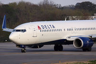 N3737C @ ORF - Delta AirLines N3737C (FLT DAL1238) exitting RWY 5 after arrival from Hartsfield-Jackson Atlanta Int'l (KATL). If you look closely, you can see the HUD in front of the pilot.