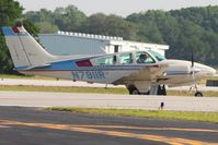 N7911R @ LAL - Departing Lakeland, FL during Sun N Fun 2010 - by Bob Simmermon