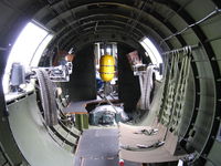 N5017N @ OXR - 1944 Boeing B-17G Flying Fortress 'Aluminum Overcast', waist machine guns. Looking forward. - by Doug Robertson