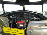 N5017N @ OXR - 1944 Boeing B-17G Flying Fortress 'Aluminum Overcast', 'greenhouse', flight controls, panels-modenized and engine controls. Note: GPS chartplotter top center between hand holds - by Doug Robertson