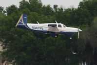 N887PS @ LAL - Arriving at Lakeland, FL during Sun N Fun 2010.