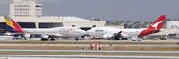 VH-OEH @ KLAX - Taxi at LAX - by Todd Royer