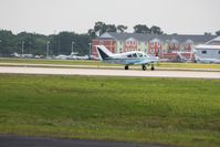 N33MD @ LAL - Departing Lakeland, FL during Sun N Fun 2010